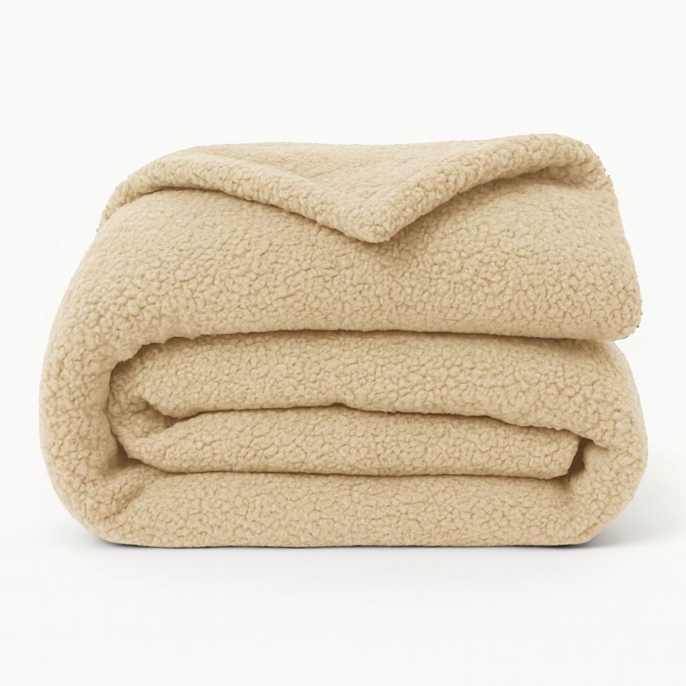 Béžová deka z materiálu bouclé