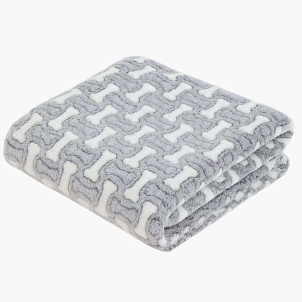 Fleecová deka poskytujúca psovi teplo a pohodlie